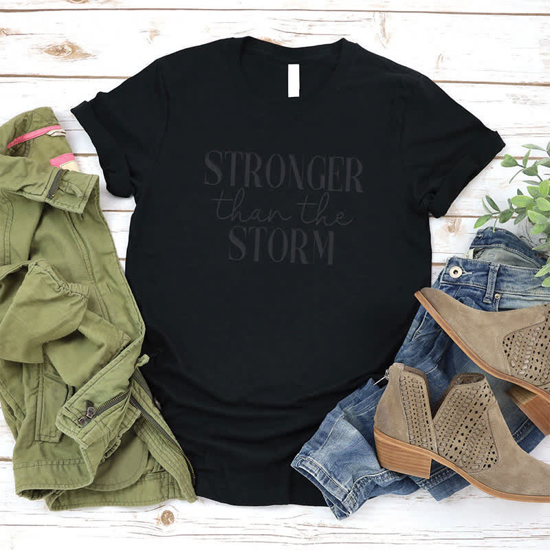 Christianartworkshop Storm Conqueror: Empowering Message T-Shirt