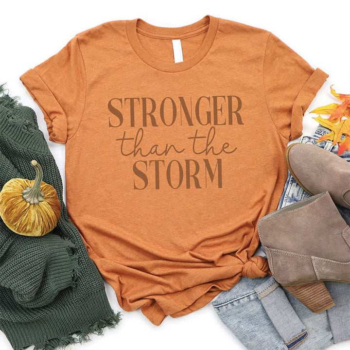 Christianartworkshop Storm Conqueror: Empowering Message T-Shirt