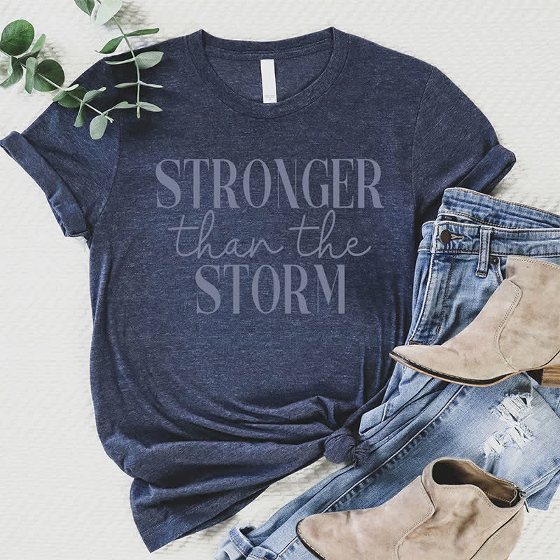 Christianartworkshop Storm Conqueror: Empowering Message T-Shirt