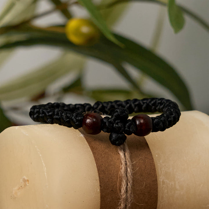 Christianartworkshop Blue & Black Cross - Knot String Bracelet: A Token of Faith