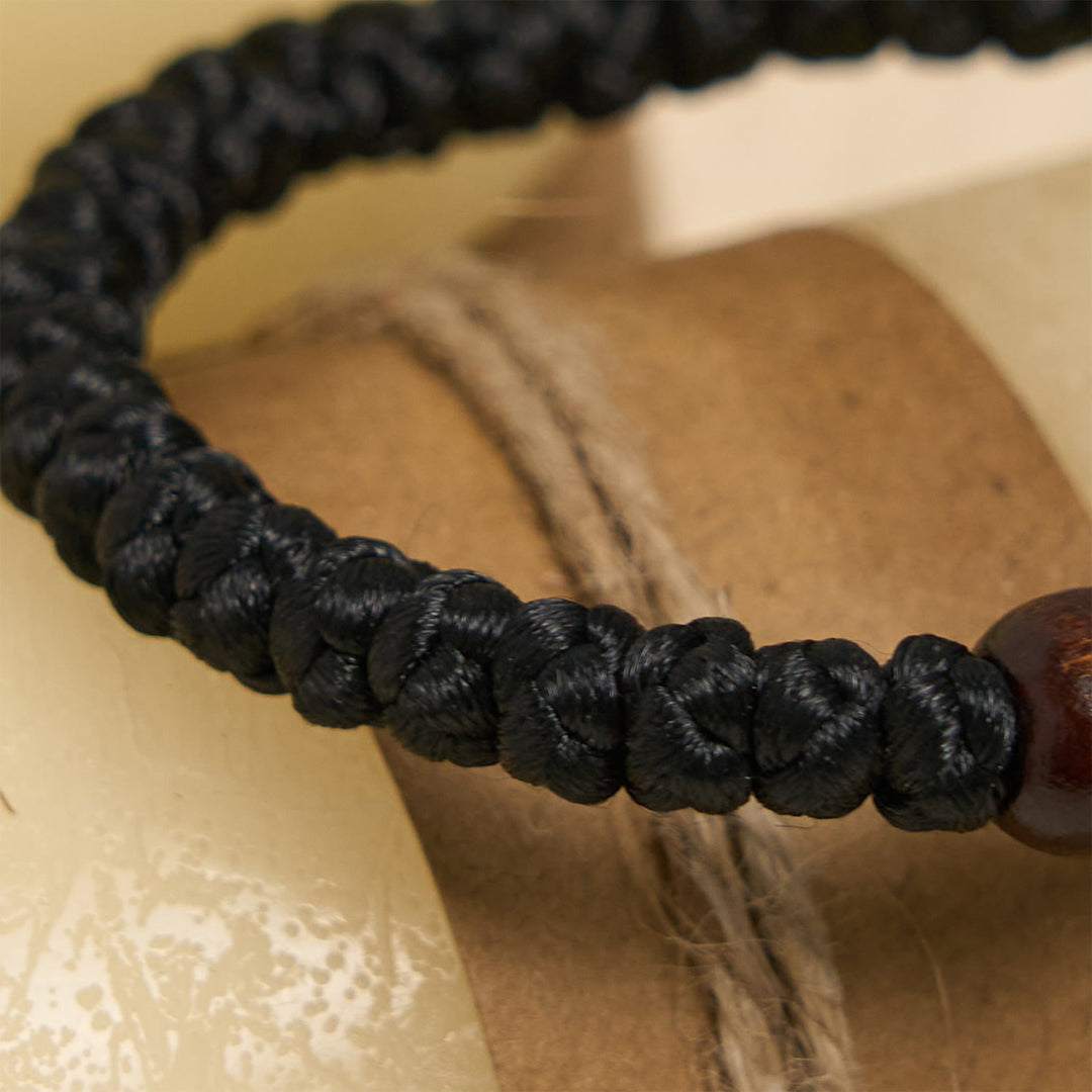 Christianartworkshop Blue & Black Cross - Knot String Bracelet: A Token of Faith