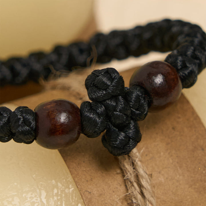 Christianartworkshop Blue & Black Cross - Knot String Bracelet: A Token of Faith
