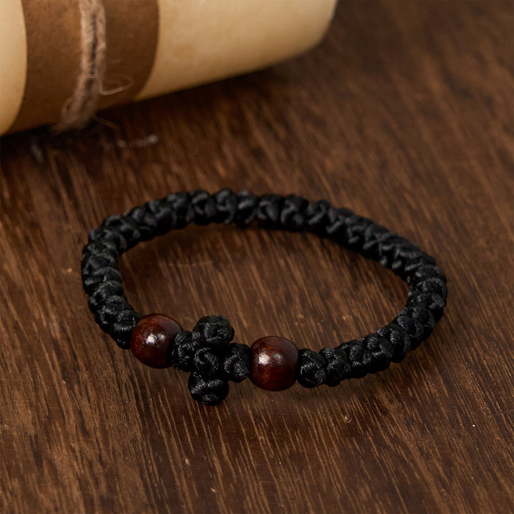 Christianartworkshop Blue & Black Cross - Knot String Bracelet: A Token of Faith