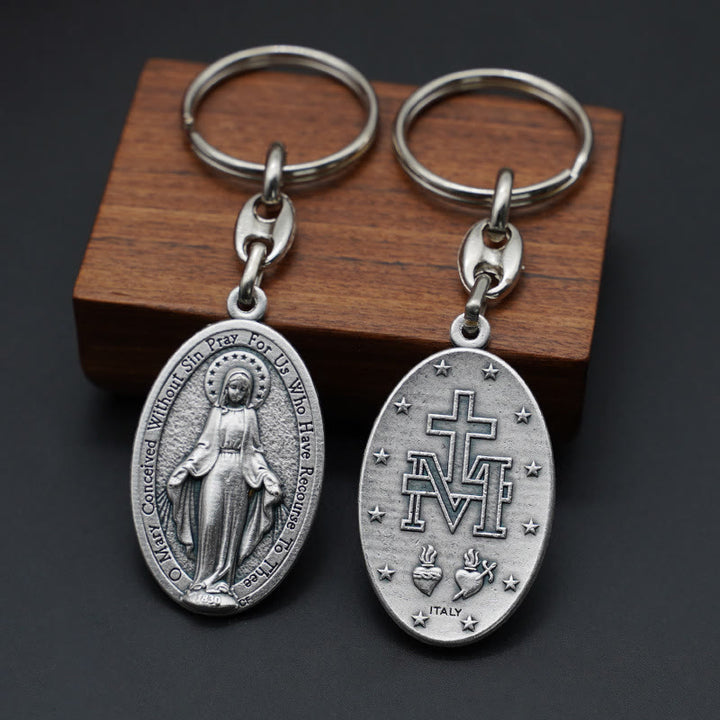 Christianartworkshop Classic Hand-Carved Mary Miraculous Medal Keychain: Graceful Sign of Devotional Faith