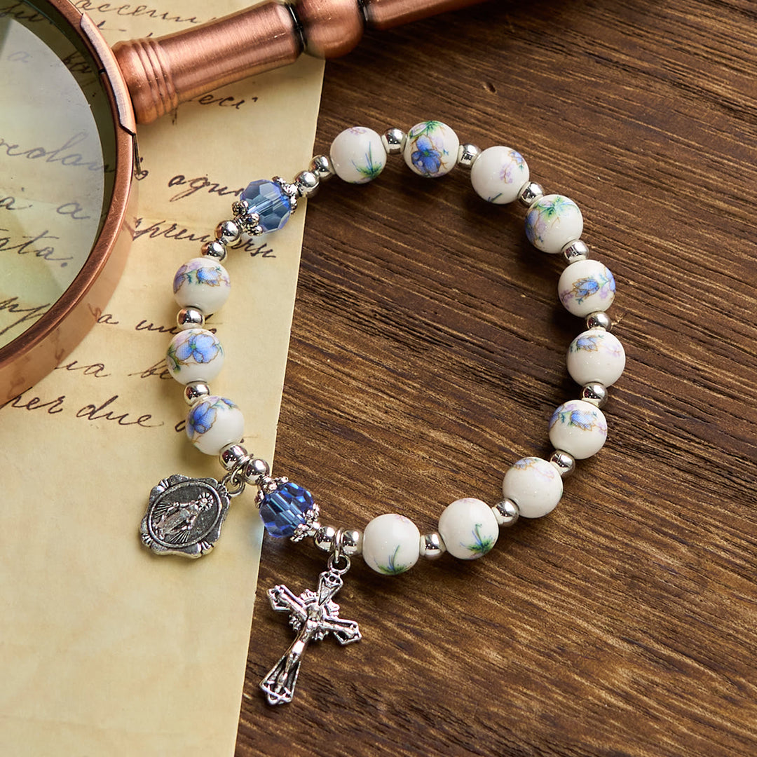 Christianartworkshop Multi-color Floral Ceramic Stretch Bracelet with Miraculous Medal & Crucifix: Subtle Faith Elegance - Blue - image 1
