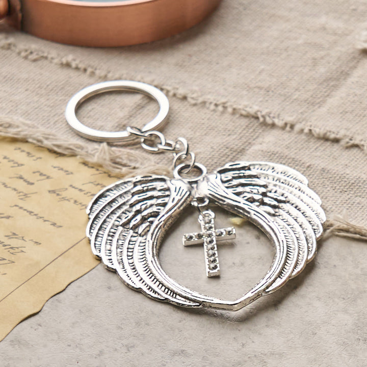 Christianartworkshop Silver Heart-Shaped Angel Wings with Cross or Pendant: A Symbol of Love and Protection