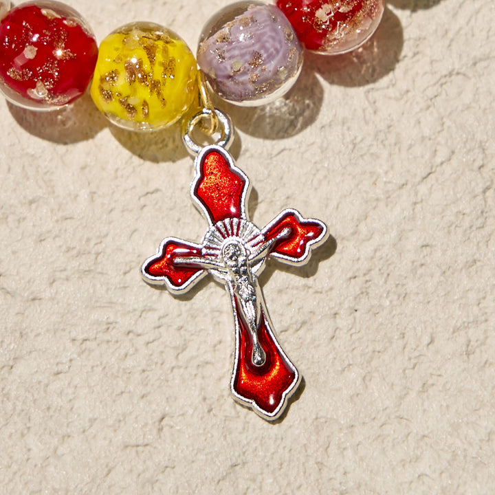 FREE Today: Colorful Glow-in-the-Dark Gold-Flecked Glass Bracelets with Crucifix - image 4