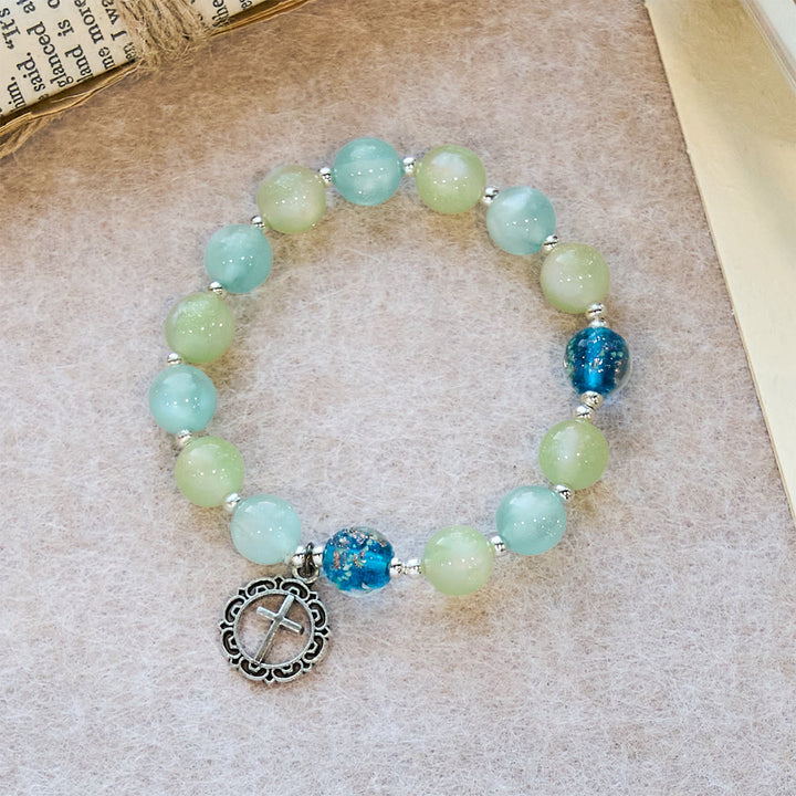 FREE Today: UV-Changing Glitter Bead Bracelet with Ornate Cross: Shimmer in Faithful Hues - image 2