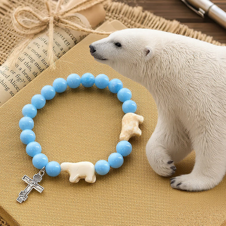 Christianartworkshop Blue Bead Polar Bear Handmade Cross Bracelet: Save Our Polar Bears - Wrist Circumference: 7.48"/19cm - image 0