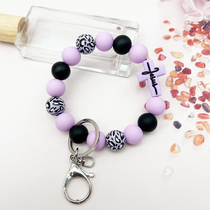 Christianartworkshop Rosary Keychain with Silicone Cross Charm & Leopard-Print Wooden Beads: Portable Devotion on the Go - Purple - image 7