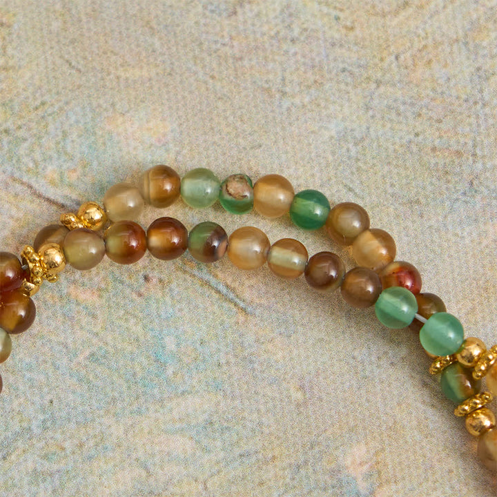 FREE Today: Peacock Agate Magnetic Rosary Bracelet with Golden St. Benedict - image 11