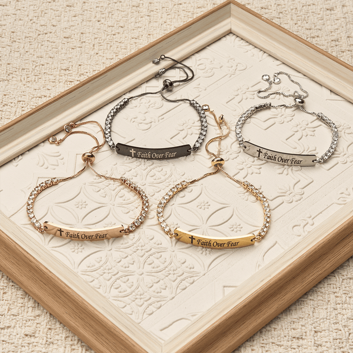 FREE Today: Four-Color Metal with Engraved Faith Over Fear Bracelet - image 0