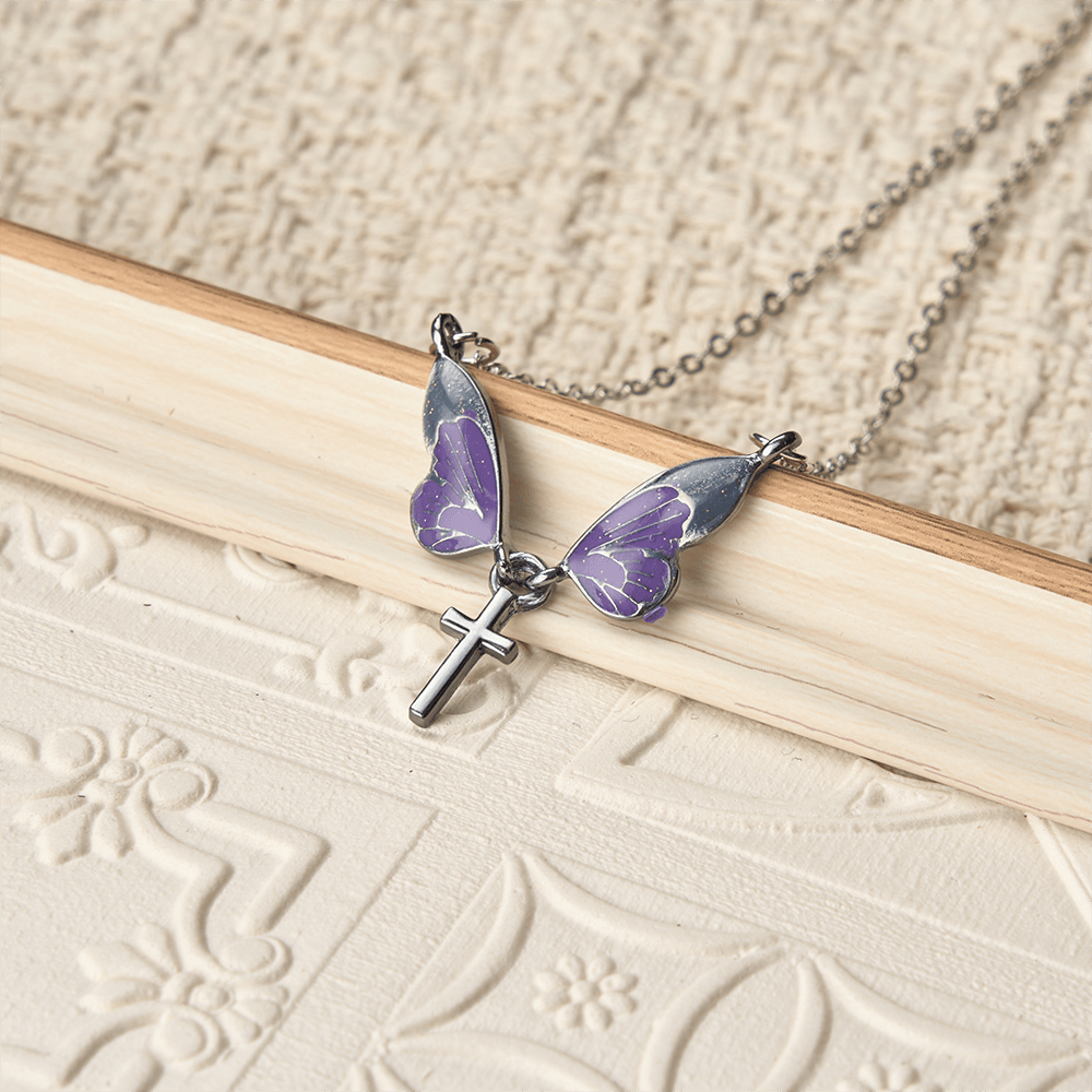 FREE Today: Whimsical Butterfly Wing Cross Pendant Necklace: A Dazzling Symbol of Divine Light and Hope - image 1