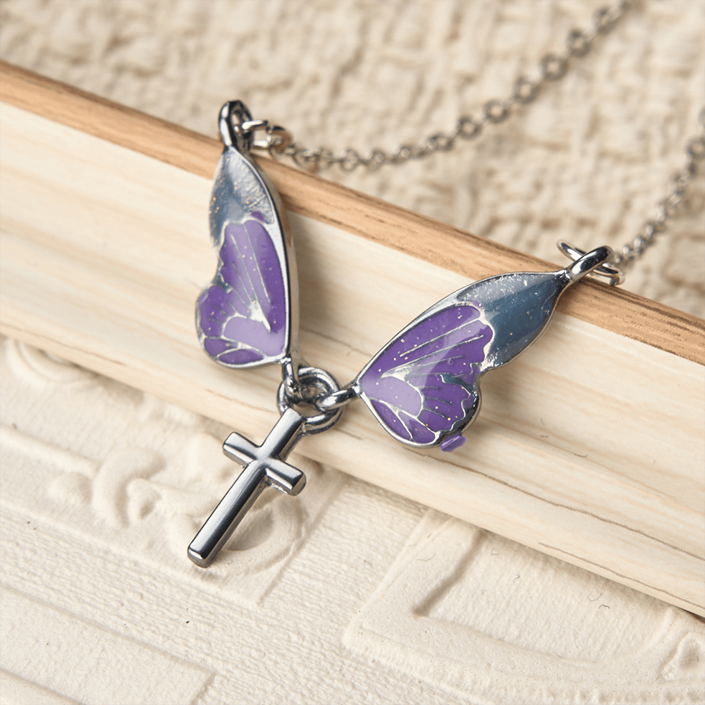 FREE Today: Whimsical Butterfly Wing Cross Pendant Necklace: A Dazzling Symbol of Divine Light and Hope - Butterfly & Cross - image 0