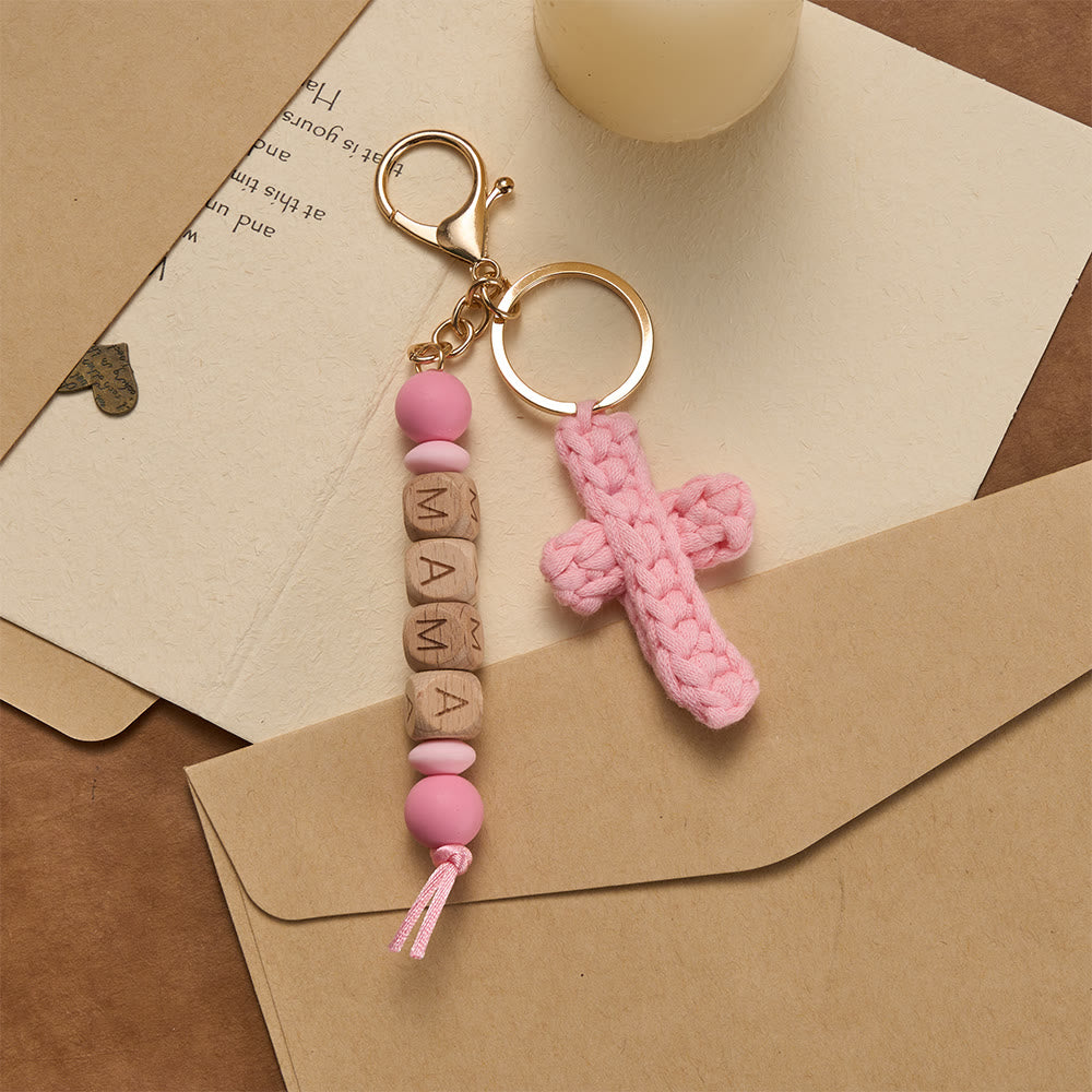 Christianartworkshop Soft Crochet Cross Keychain with “MAMA” Engraved Beads: Embody Faithful Grace & Warmth - Pink - image 0