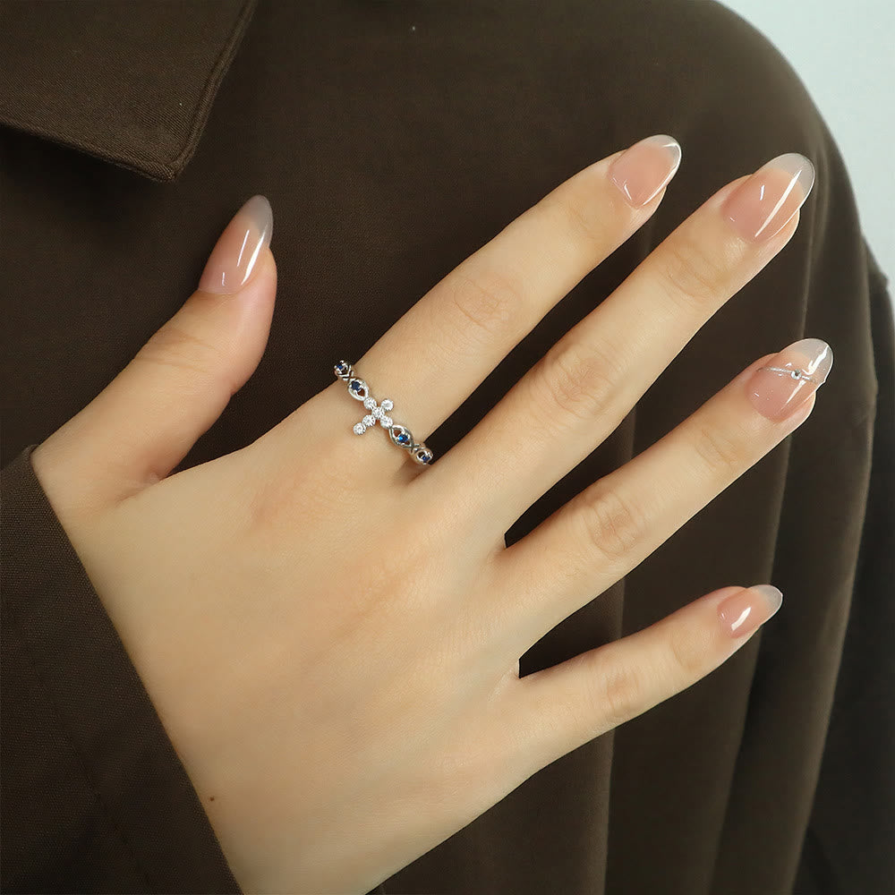Christianartworkshop Dainty Cross Ring with Blue Zircon Accents: A Symbol of Faith and Serenity - image 1
