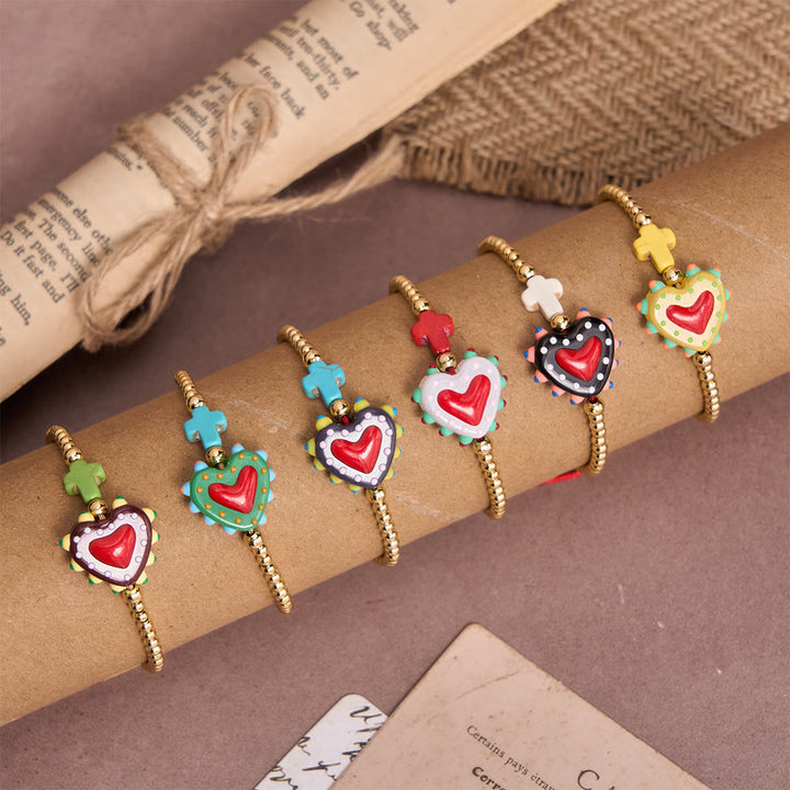 FREE Today: Cartoon Style Hand-Decorated Sacred Heart & Tiny Cross Accent Gold Bead Adjustable Cord Bracelet - image 0
