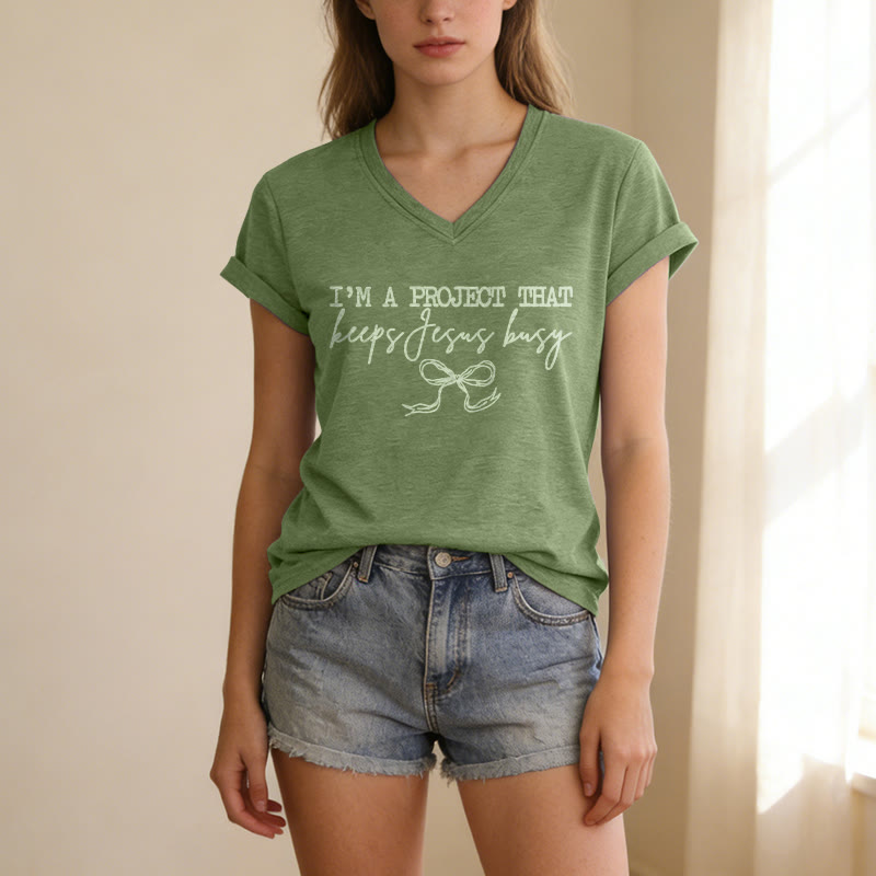 Christianartworkshop "I’m A Project That Keeps Jesus Busy" Bow Script Casual V-neck T-shirt - image 17
