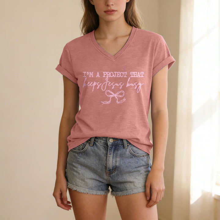 Christianartworkshop "I’m A Project That Keeps Jesus Busy" Bow Script Casual V-neck T-shirt - image 11