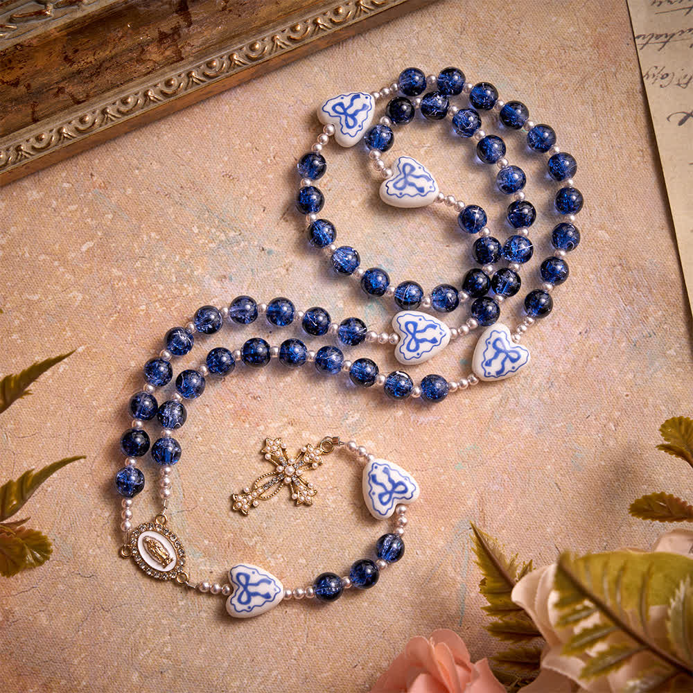 Christianartworkshop Blue Crackle Glass Rosary With Ceramic Heart Bow Beads & Our Lady Medal - Blue - image 0