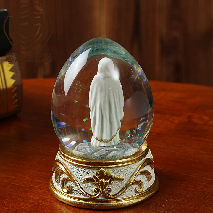 Christianartworkshop Egg Shaped Glitter Snow Globe With Praying Madonna Statue: Emblem of Pure Heavenly Supplication - image 3