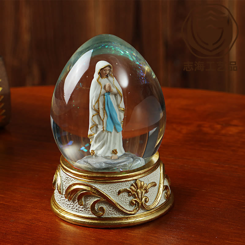 Christianartworkshop Egg Shaped Glitter Snow Globe With Praying Madonna Statue: Emblem of Pure Heavenly Supplication - image 2