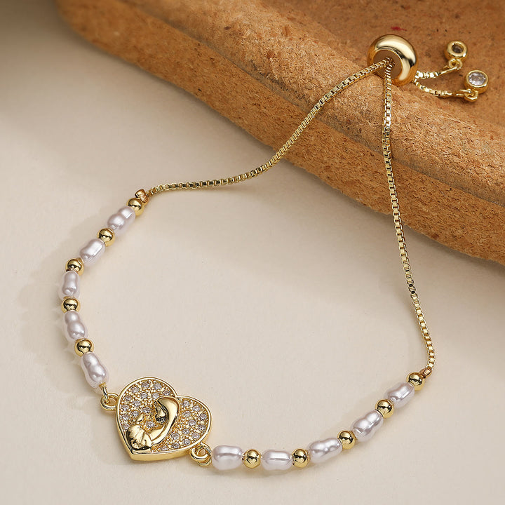 Christianartworkshop Refined Multi‑Style Holy‑Medallion Pearl Bracelet: Icon of Quiet Spiritual Strength for Everyday Wear - Solid heart‑shaped - image 1