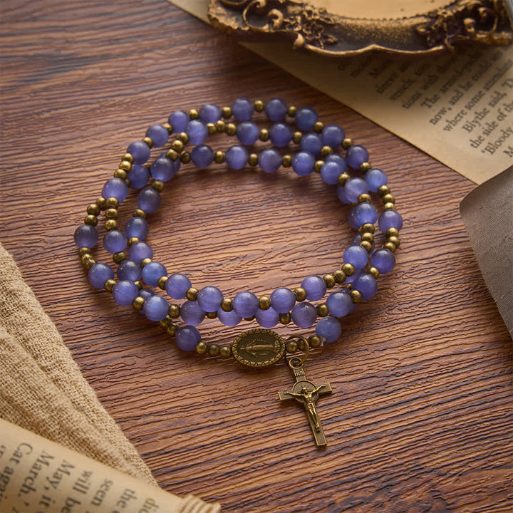 FREE Today: Lustrous Purple Cat’s Eye Rosary Bracelet: Bearer of Soft Heavenly Blessings - Purple Cat's Eyes Rosary Bracelet - image 0