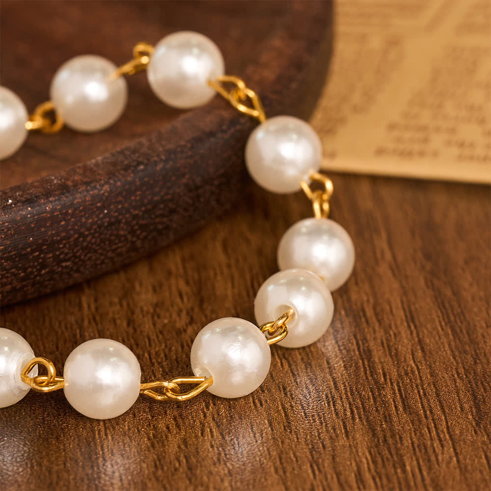 FREE Today: Pearl Strand Rearview Mirror Cross Car Pendant: Emblem of Heavenly Travel Protection - image 3