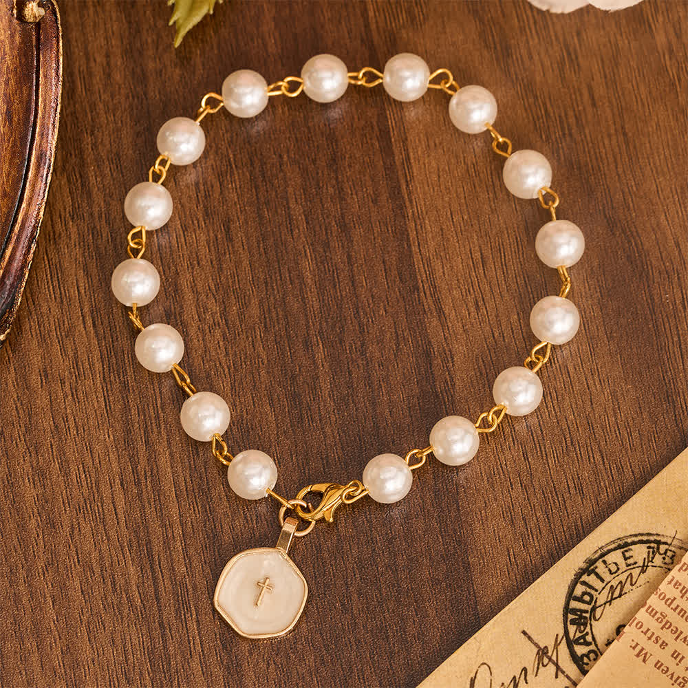 FREE Today: Pearl Strand Rearview Mirror Cross Car Pendant: Emblem of Heavenly Travel Protection - image 0