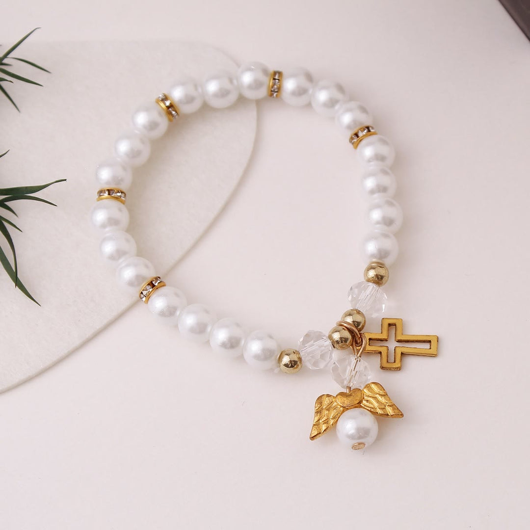 Christianartworkshop Lustrous Pearl Beaded Cross Stretch Bracelet: Emblem of Pure Heavenly Purity - image 3