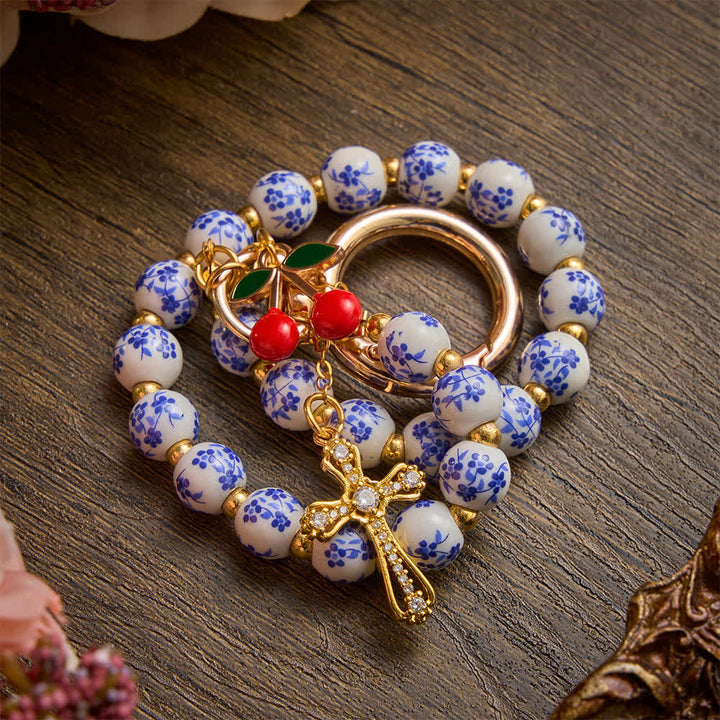 Christianartworkshop Floral Porcelain‑Bead Cherry Accent Bag Charm With Jeweled Cross: Emblem of Gentle Heavenly Grace - image 4