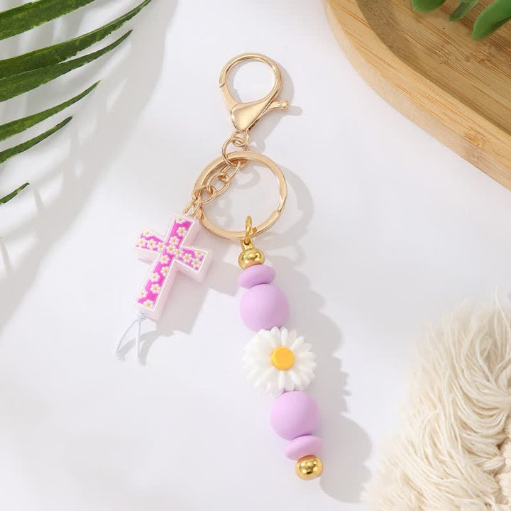 Christianartworkshop Daisy Silicone Bead Cross Keychain: Emblem of Gentle Heavenly Blessing - Purple - image 2